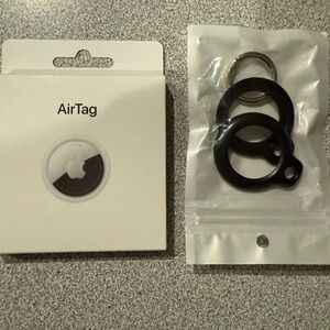Apple Air tag and case.  Both have never been opened, brand new.